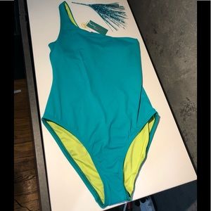 This teal beauty one strap is a must have!